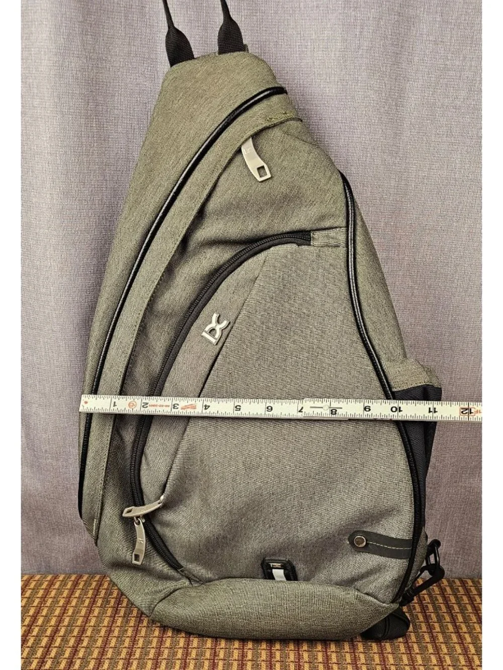 DC Sling Backpack Olive Black Adjustable Strap Multiple Compartments Durable Lig